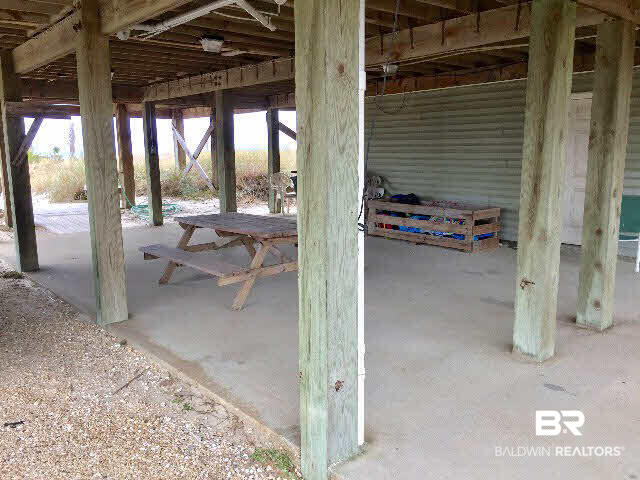 8749 Pompano Way Gulf Shores, AL 36542 - Photo 39 of 45 single file, covered parking for multiple cars to the left