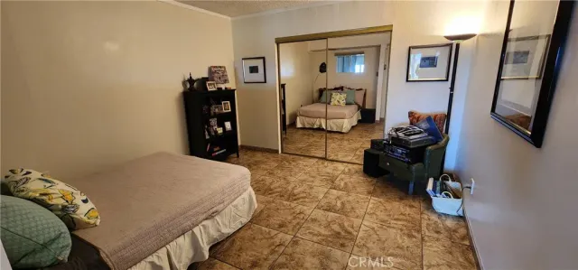 a room with furniture and wooden floor