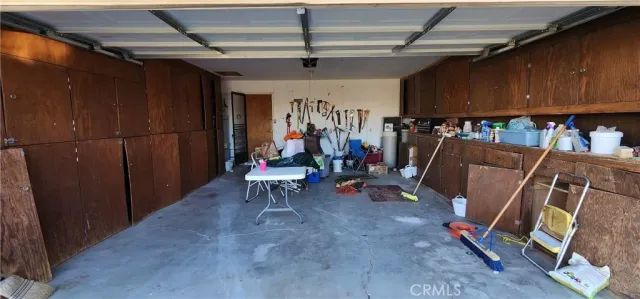 a storage room with washer and dryer