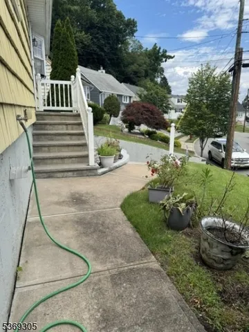 a view of a patio in backyard