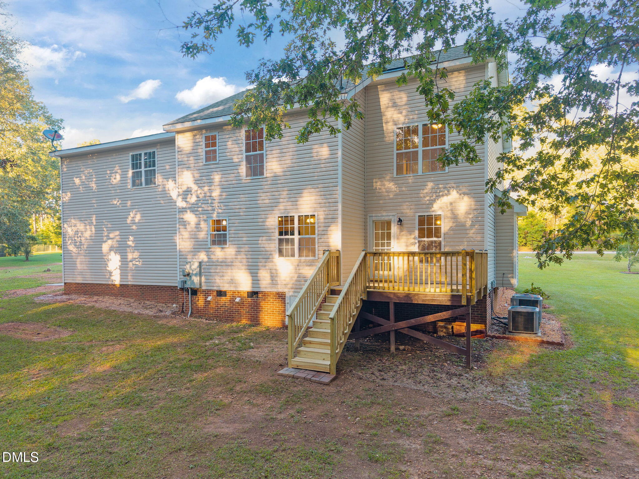 505 Vinson Road Clayton, NC 27527 - Photo 30 of 31 a view of outdoor space yard and deck