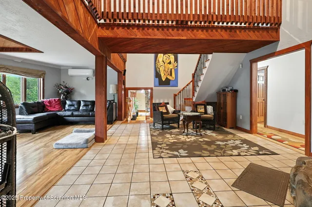 a view of a living room and kitchen