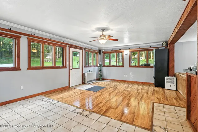 a bathroom with a sink toilet and mirror