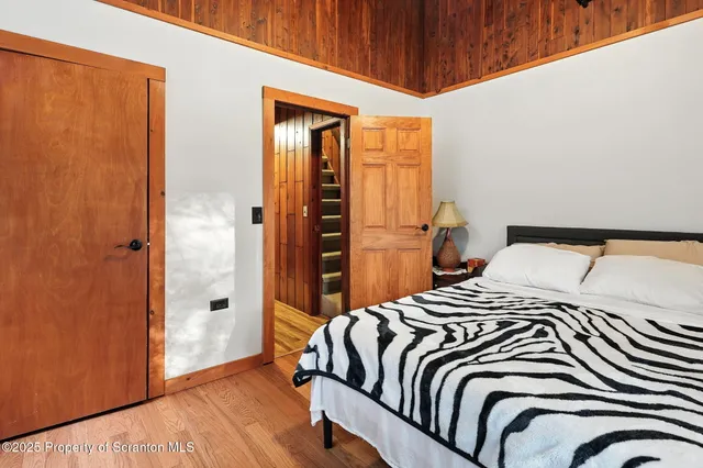 a view of a house with a yard and garage