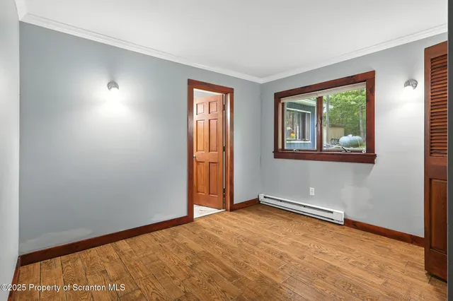 a view of a lake with houses in the background