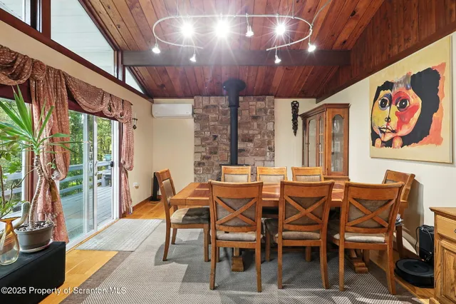 a view of a livingroom with furniture and a fireplace