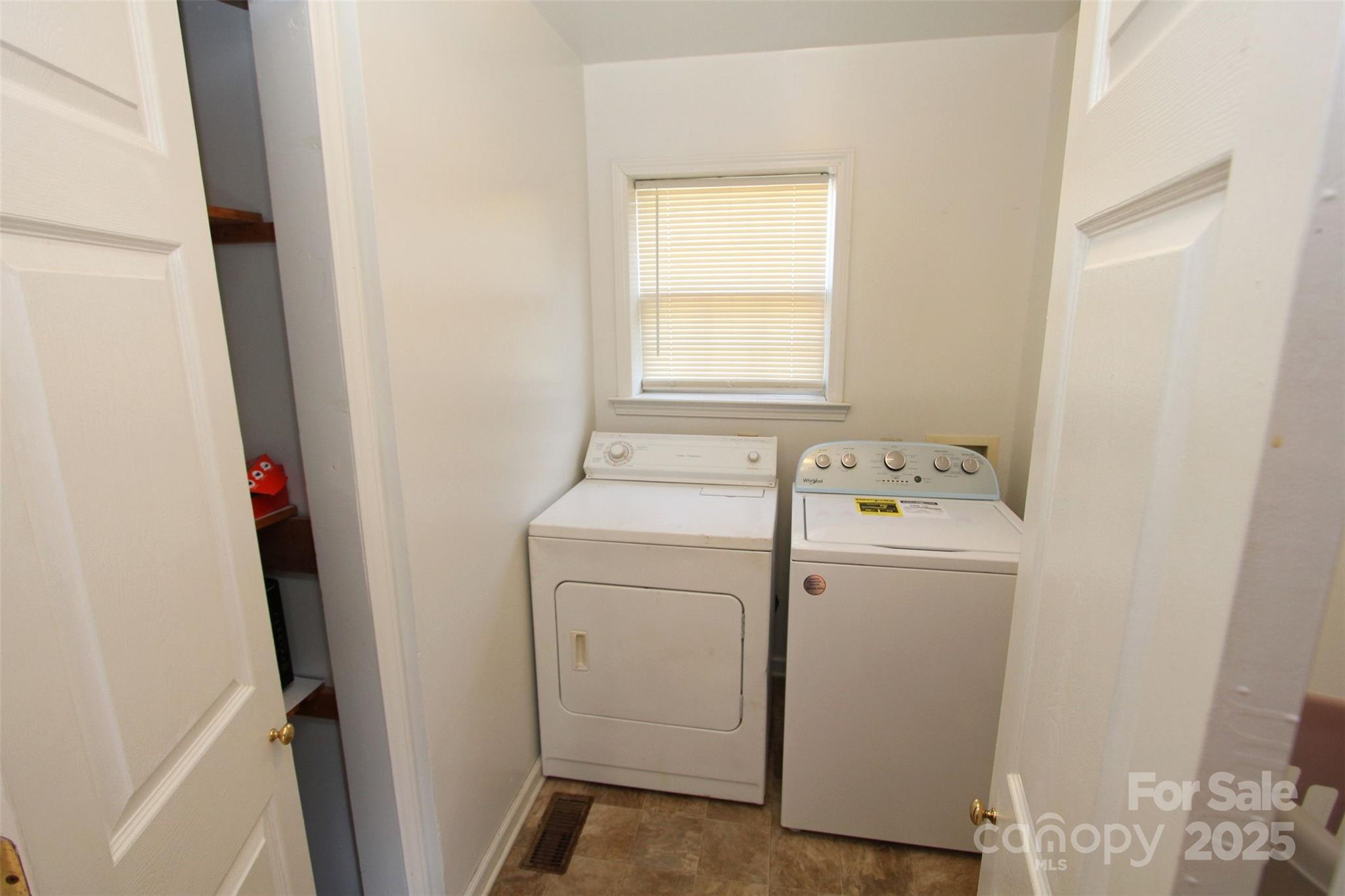 843 Upper White Store Road Peachland, NC 28133 - Photo 15 of 48 a utility room with dryer and washer