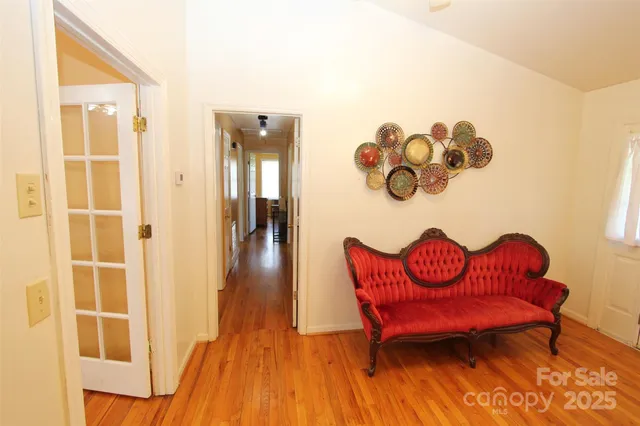 a view of livingroom with furniture and wooden floor