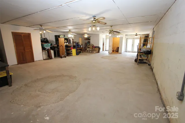 a kitchen with a sink refrigerator and stove