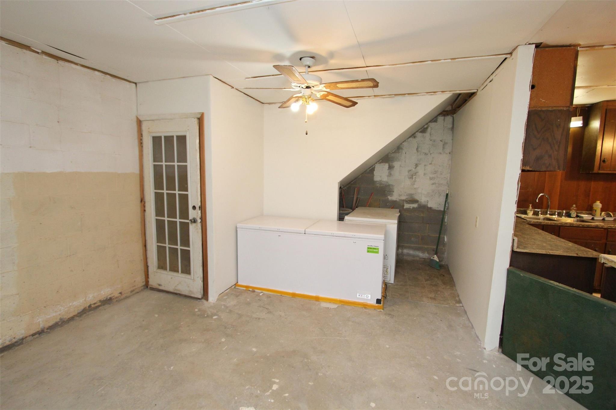 843 Upper White Store Road Peachland, NC 28133 - Photo 37 of 48 a view of a livingroom with furniture and ceiling fan