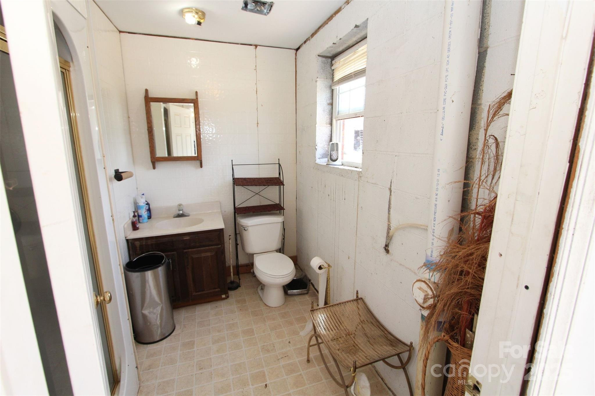 843 Upper White Store Road Peachland, NC 28133 - Photo 40 of 48 a bathroom with a toilet sink and tub