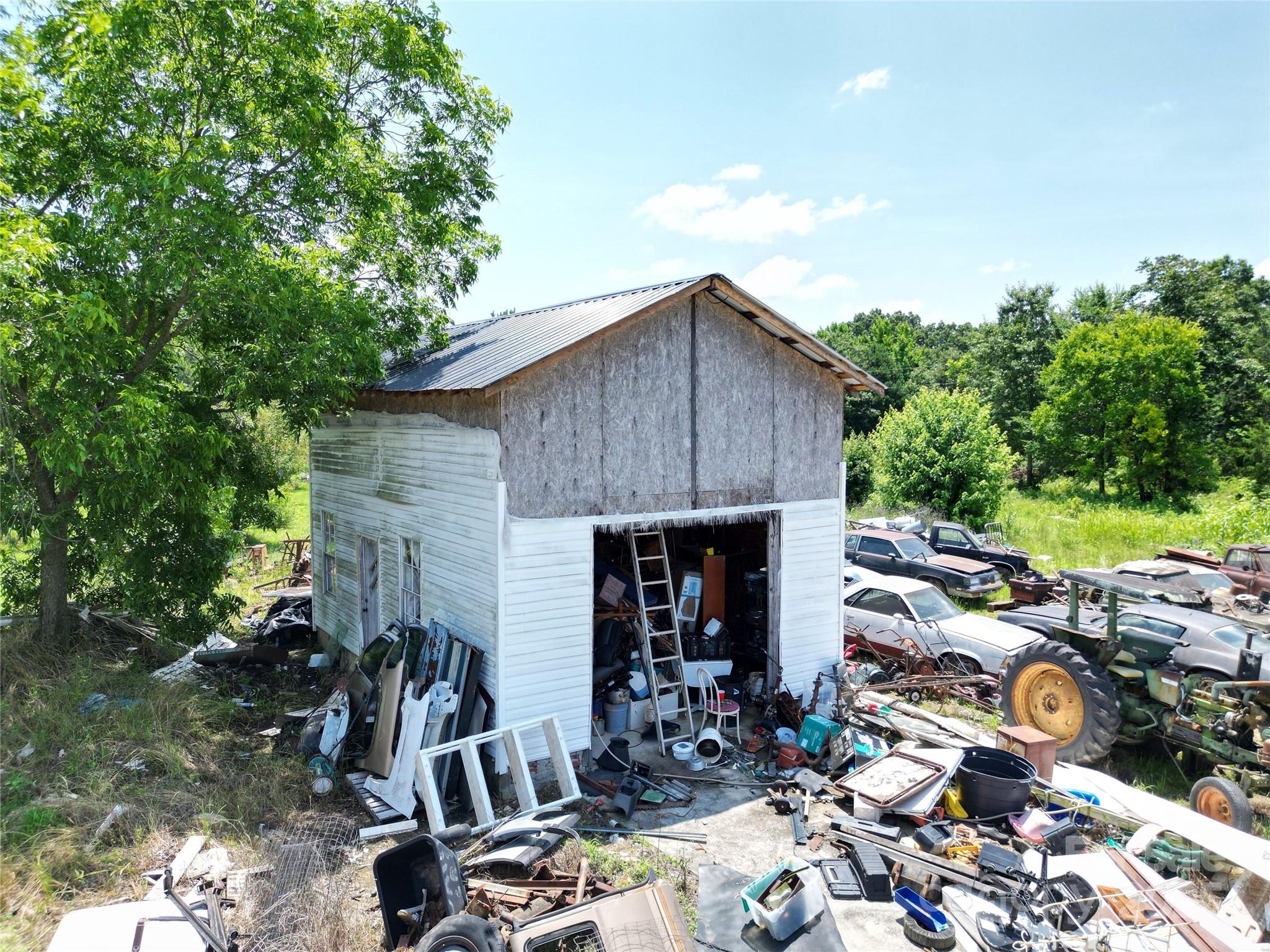 843 Upper White Store Road Peachland, NC 28133 - Photo 47 of 48 a view of backyard with wheel chair and potted plants