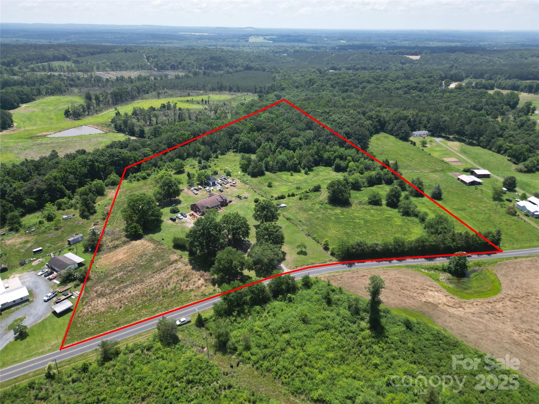 843 Upper White Store Road Peachland, NC 28133 - Photo 48 of 48 an aerial view of huge green field with lots of green plants in it