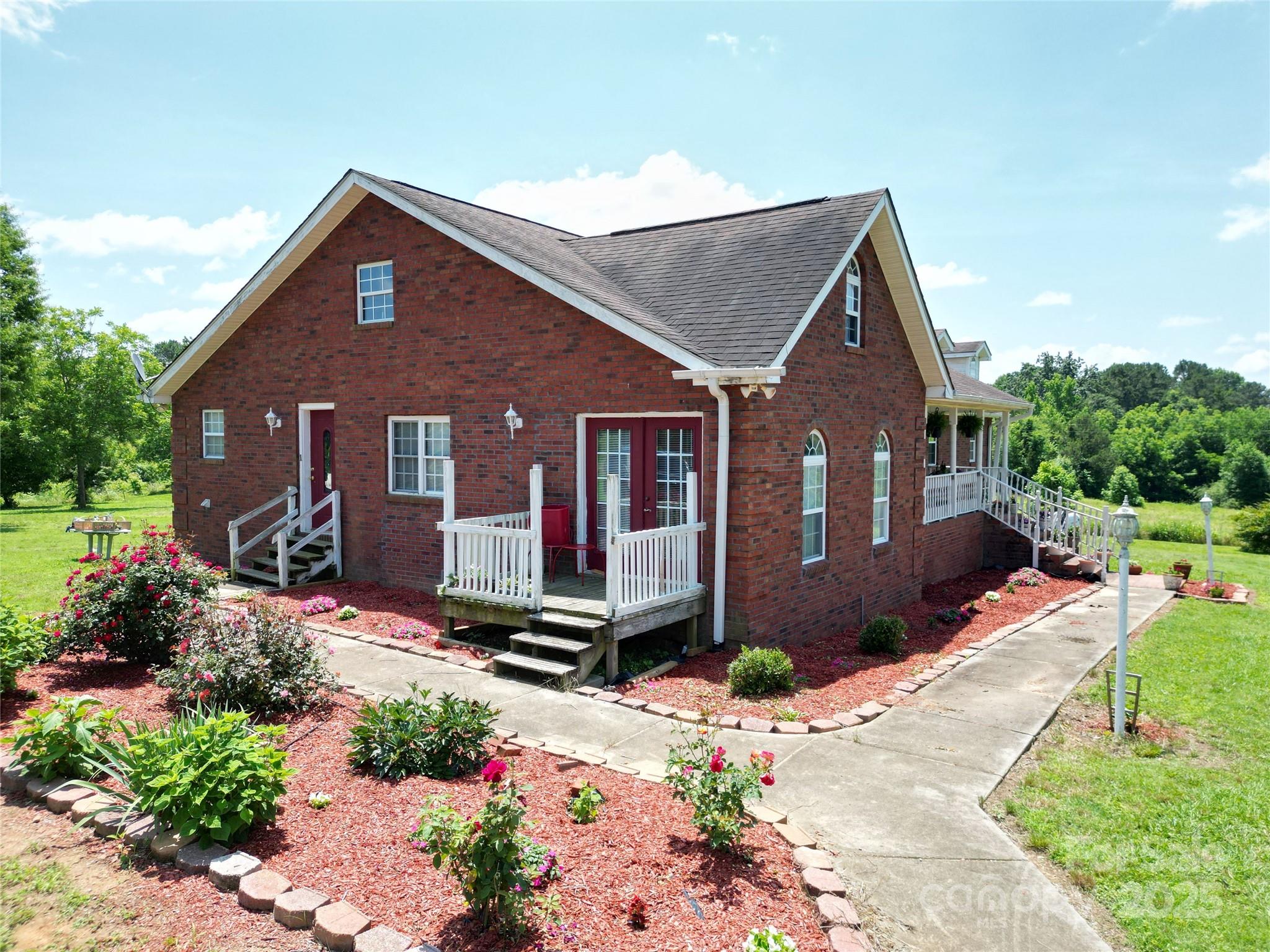 843 Upper White Store Road Peachland, NC 28133 - Photo 5 of 48 a front view of a house with a yard