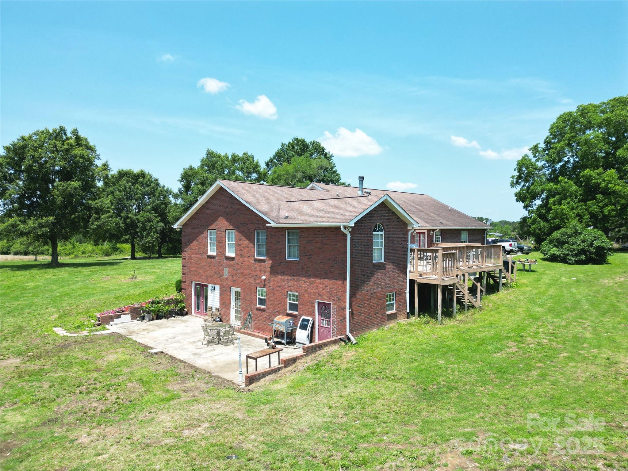 843 Upper White Store Road Peachland, NC 28133 - Photo 7 of 48 a view of a house with a big yard plants and large trees