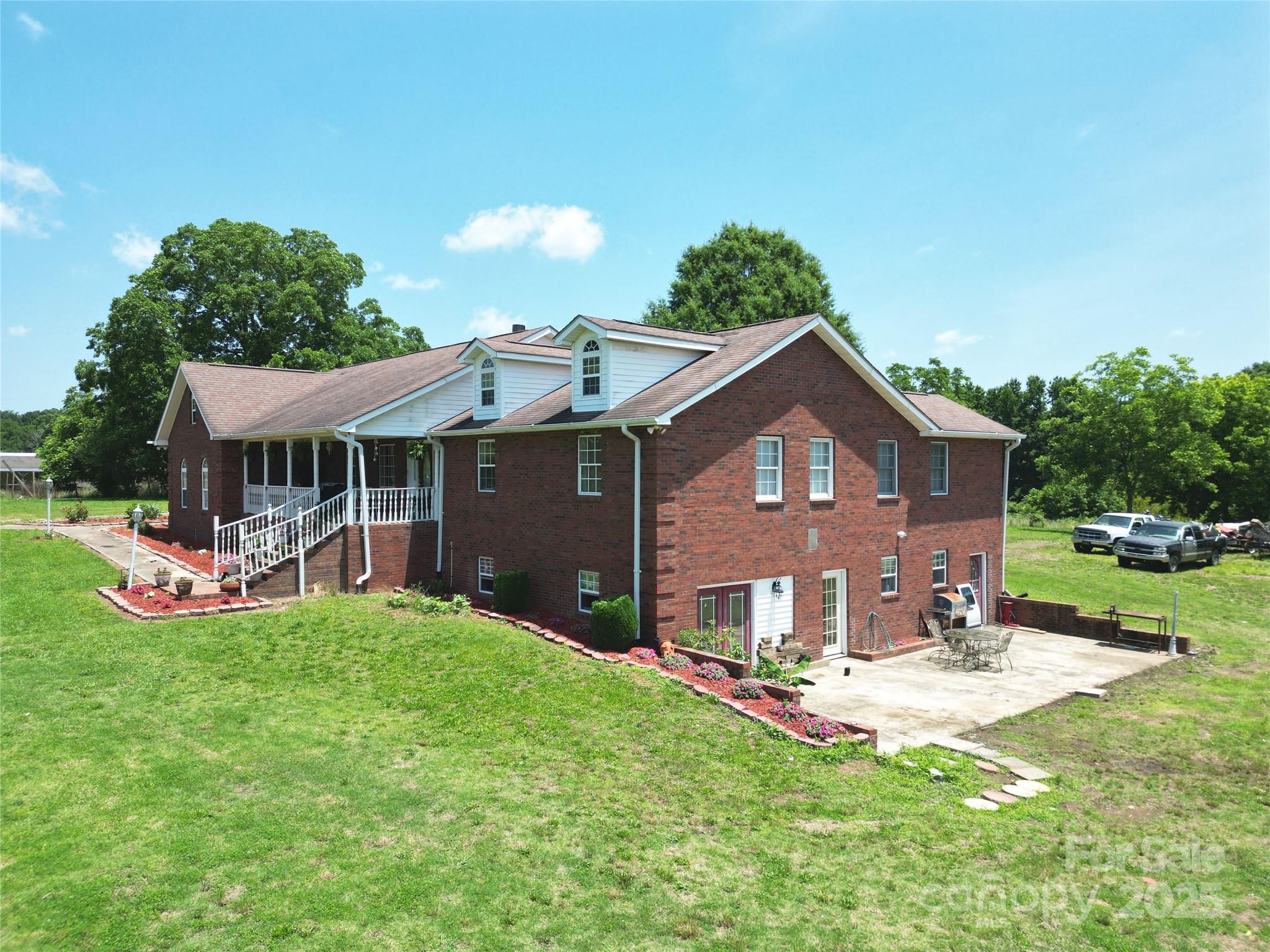 843 Upper White Store Road Peachland, NC 28133 - Photo 8 of 48 a front view of a house with yard and green space