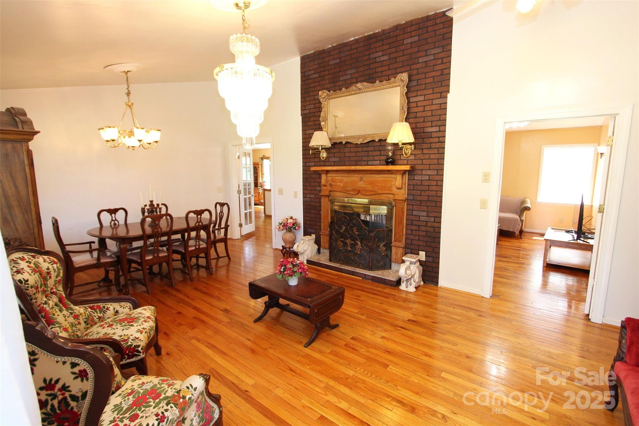 843 Upper White Store Road Peachland, NC 28133 - Photo 9 of 48 a living room with furniture and a fireplace
