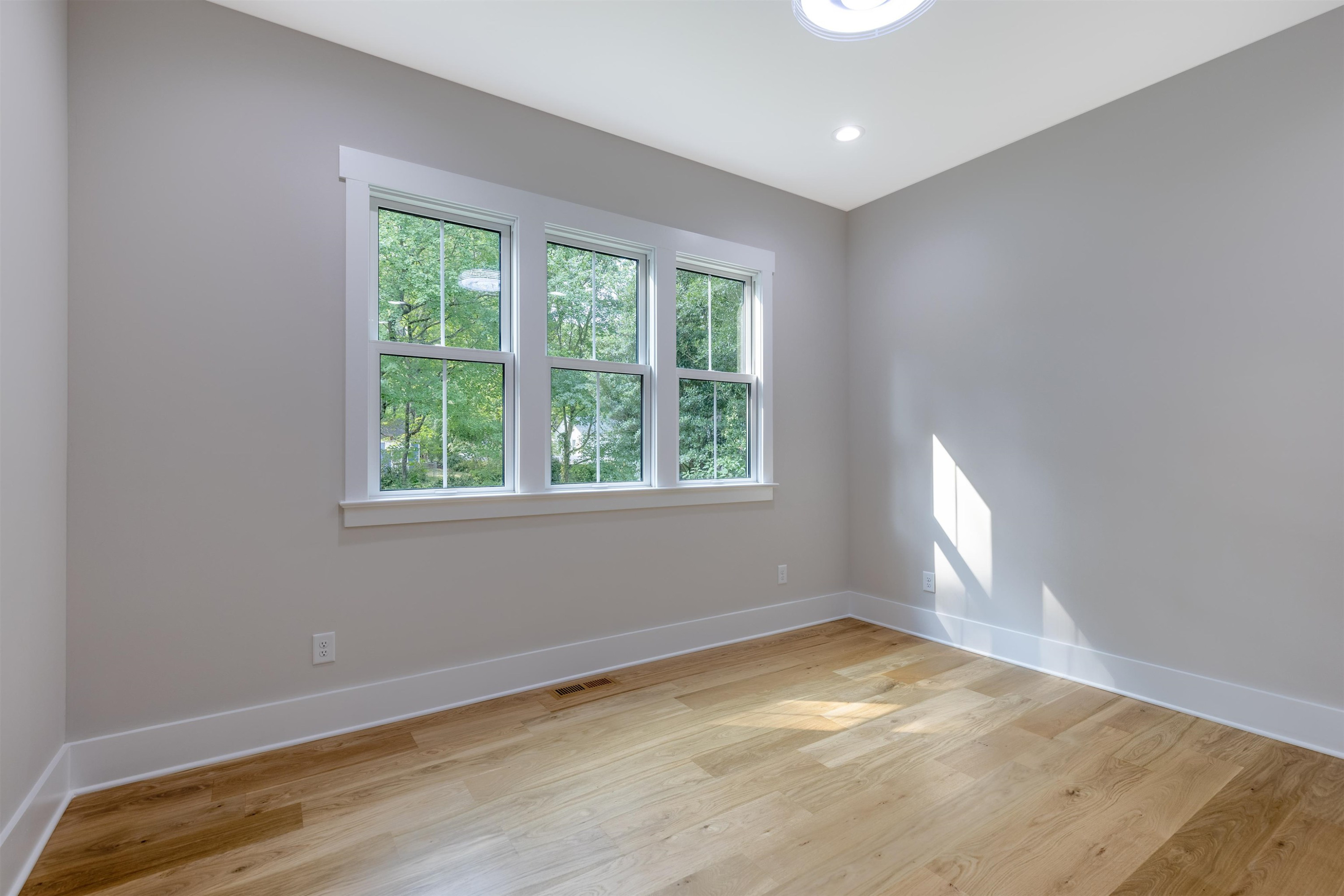 336 Waldo Street Cary, NC 27511 - Photo 23 of 62 an empty room with a window