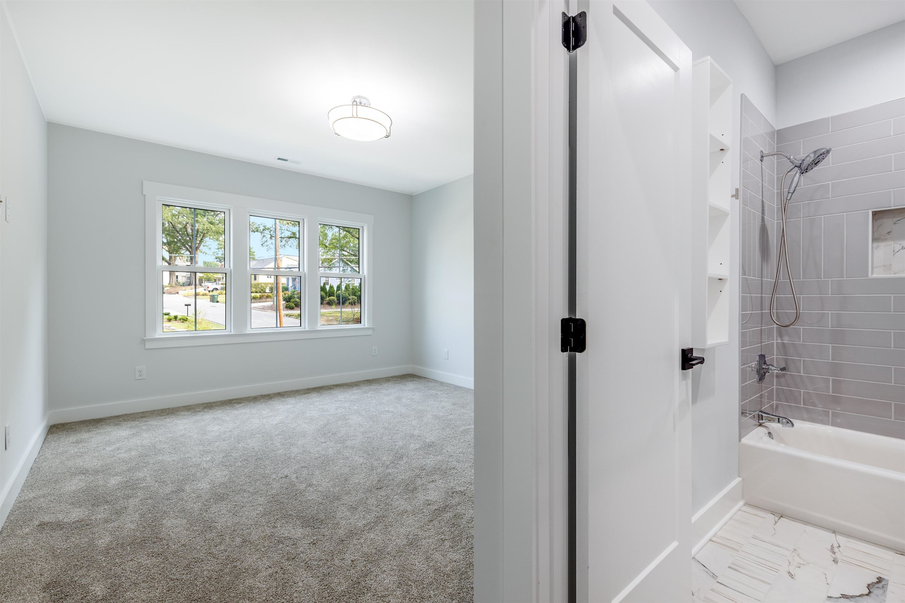 336 Waldo Street Cary, NC 27511 - Photo 32 of 62 a view of an empty room with a window
