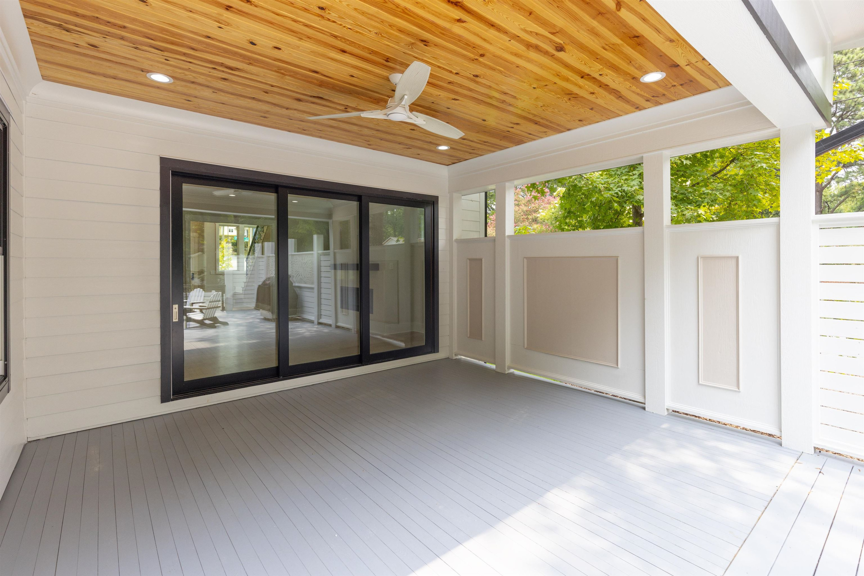 336 Waldo Street Cary, NC 27511 - Photo 45 of 62 a view of an empty room with a sliding door
