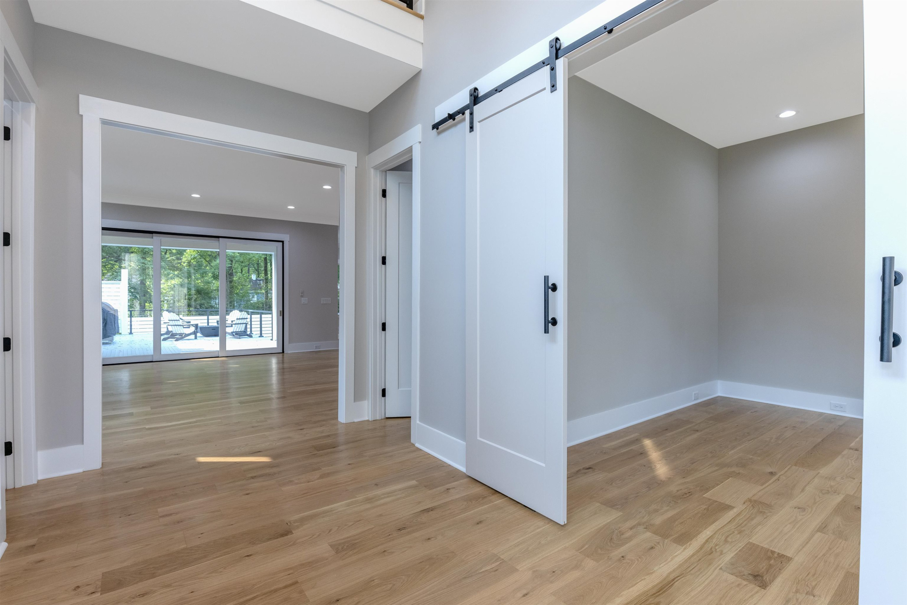336 Waldo Street Cary, NC 27511 - Photo 5 of 62 a view of a hallway with wooden floor and a cabinet