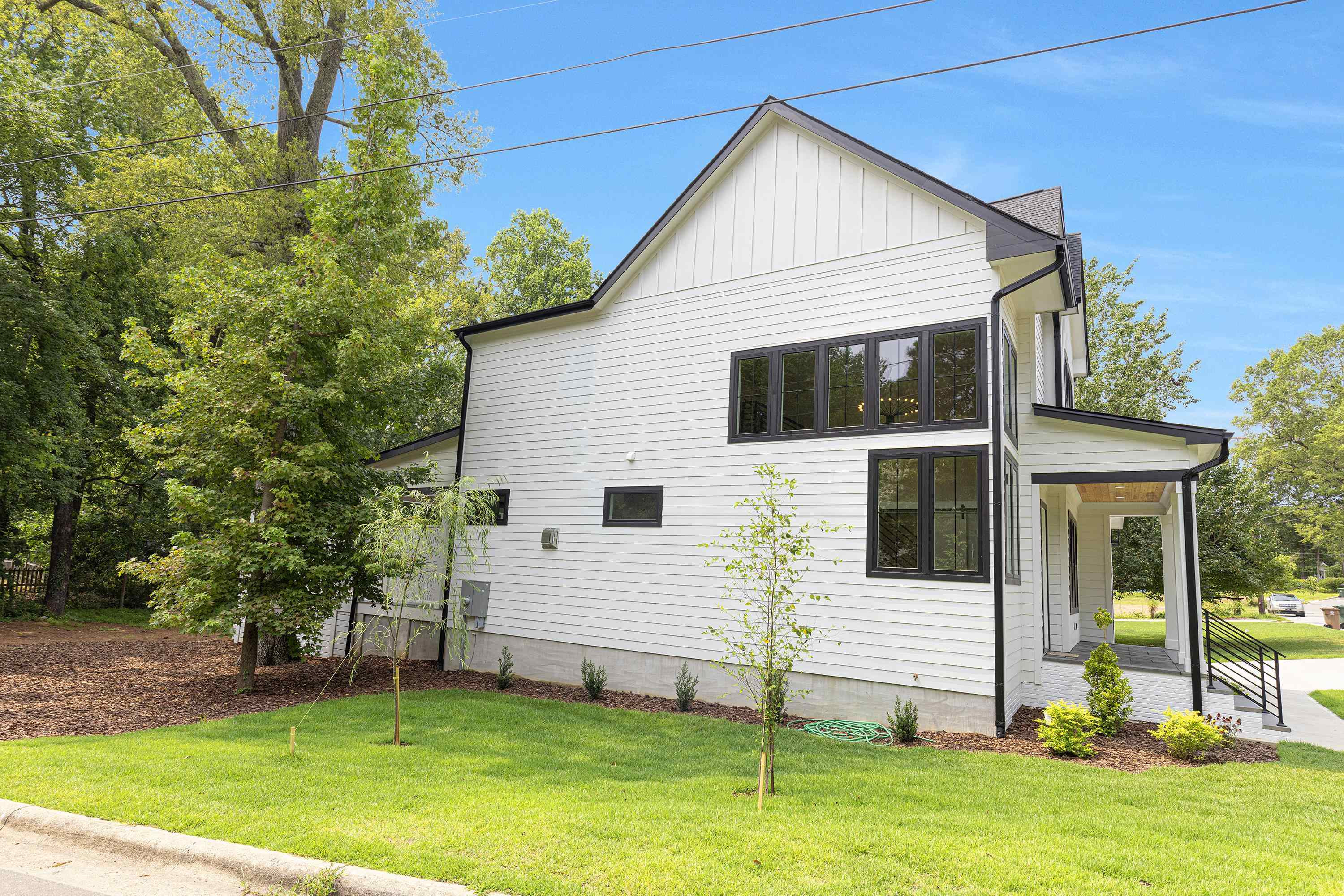 336 Waldo Street Cary, NC 27511 - Photo 51 of 62 a view of a house with a yard
