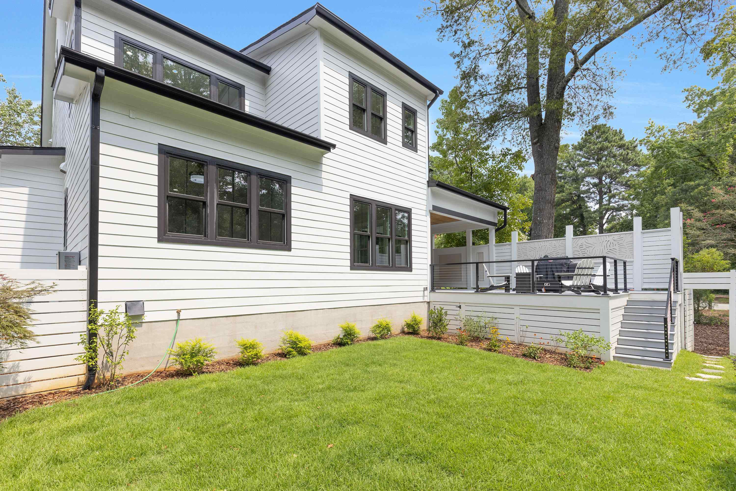 336 Waldo Street Cary, NC 27511 - Photo 52 of 62 a view of a house with a yard and sitting area
