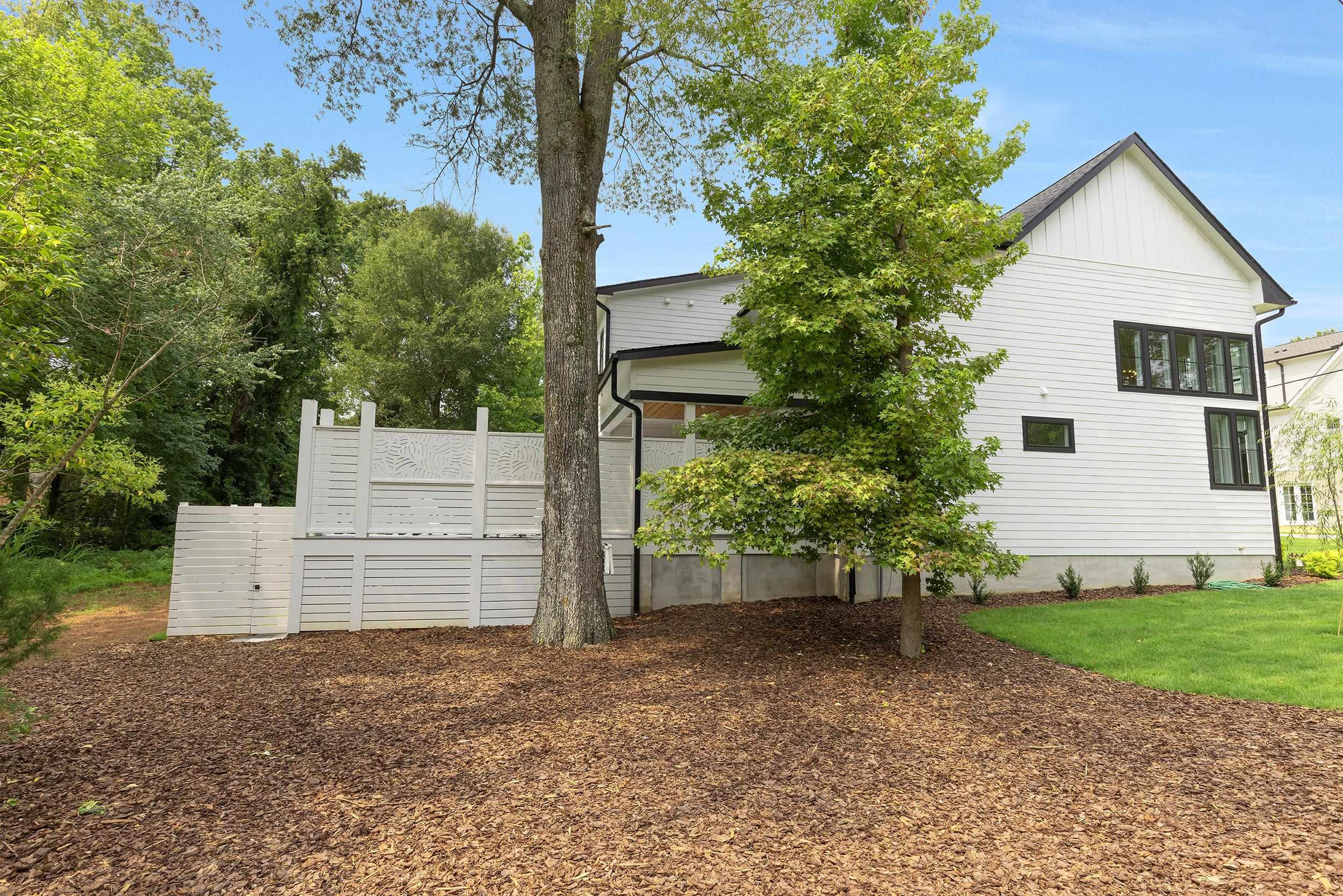 336 Waldo Street Cary, NC 27511 - Photo 56 of 62 a backyard of a house with table and chairs