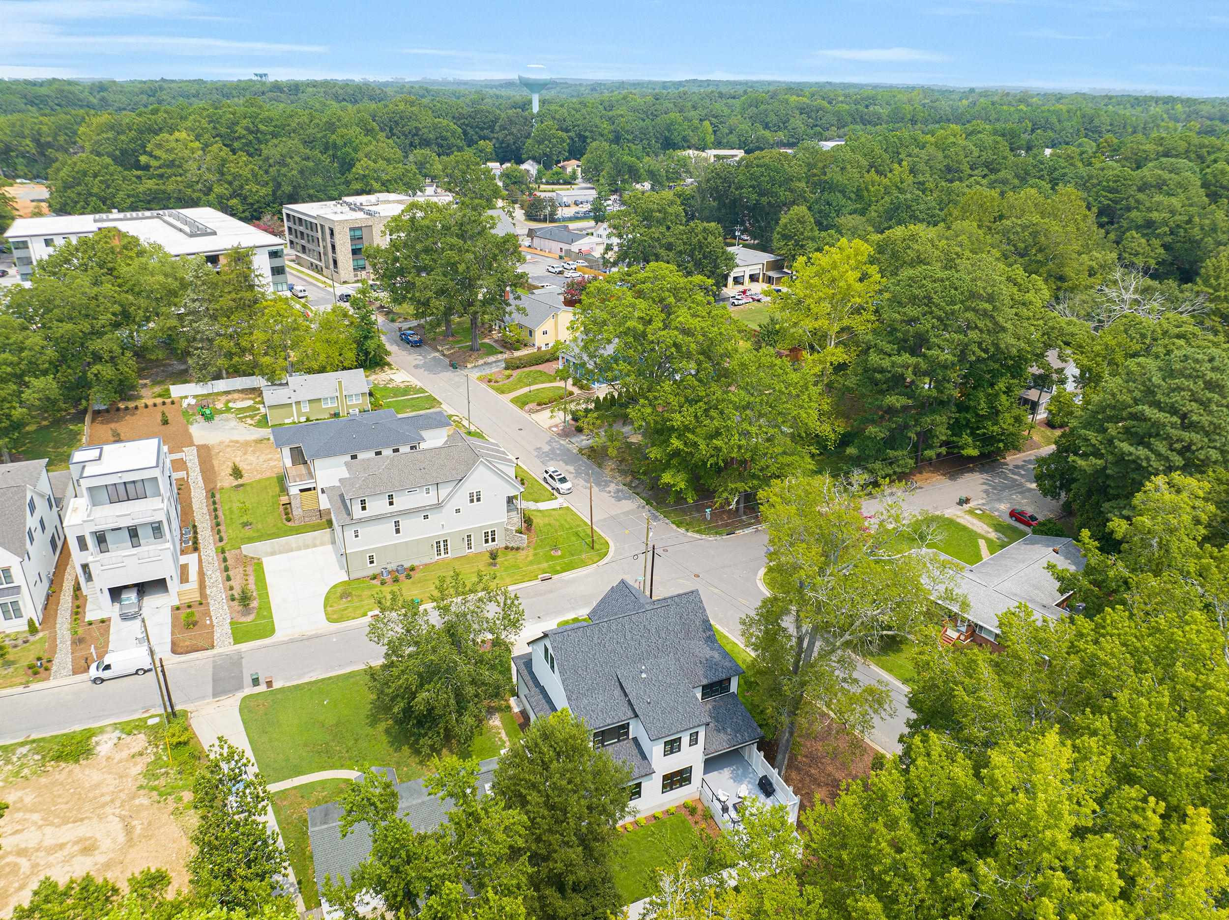 336 Waldo Street Cary, NC 27511 - Photo 61 of 62 an aerial view of residential houses with outdoor space and trees