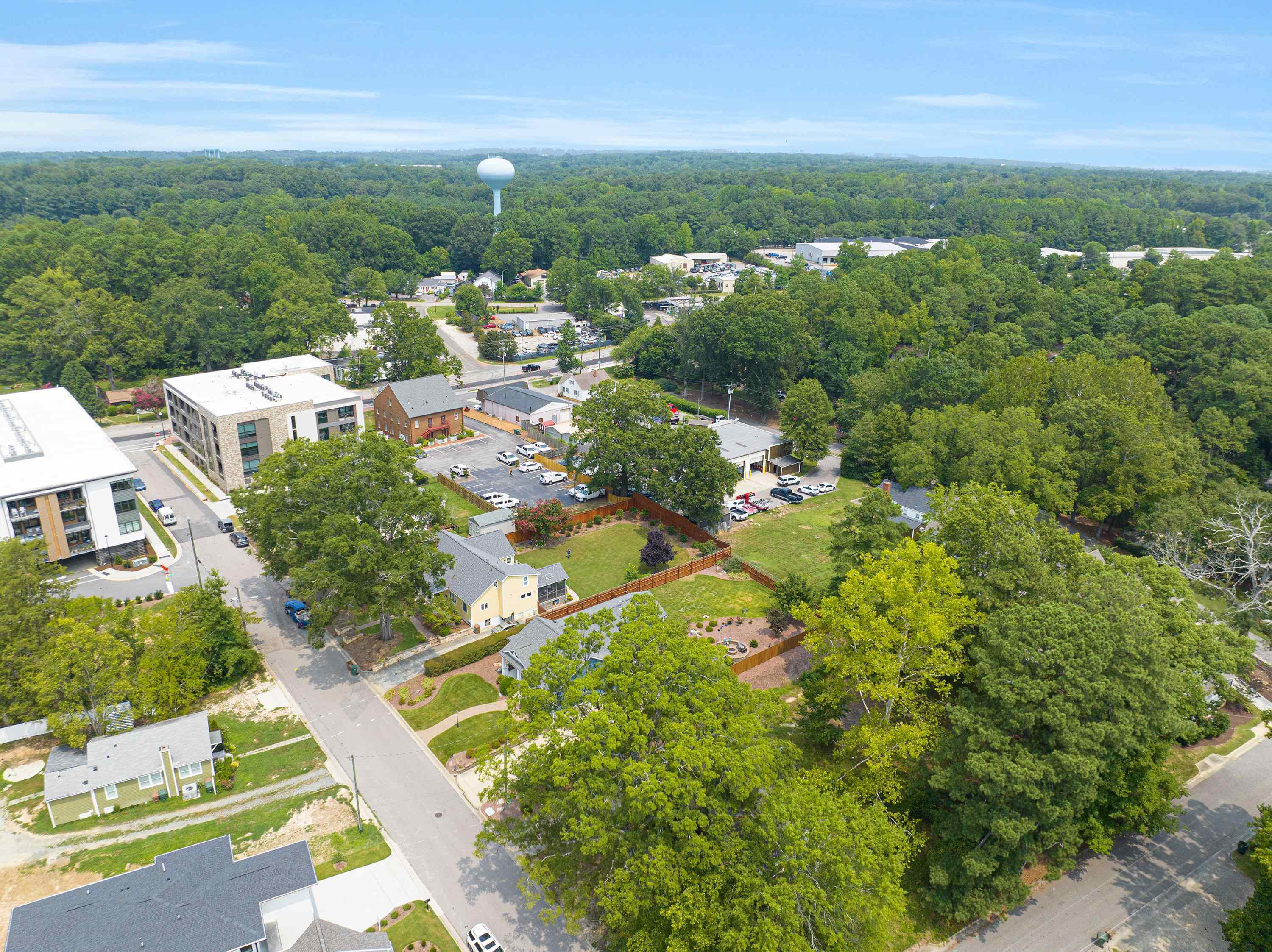 336 Waldo Street Cary, NC 27511 - Photo 62 of 62 an aerial view of residential houses with outdoor space and trees