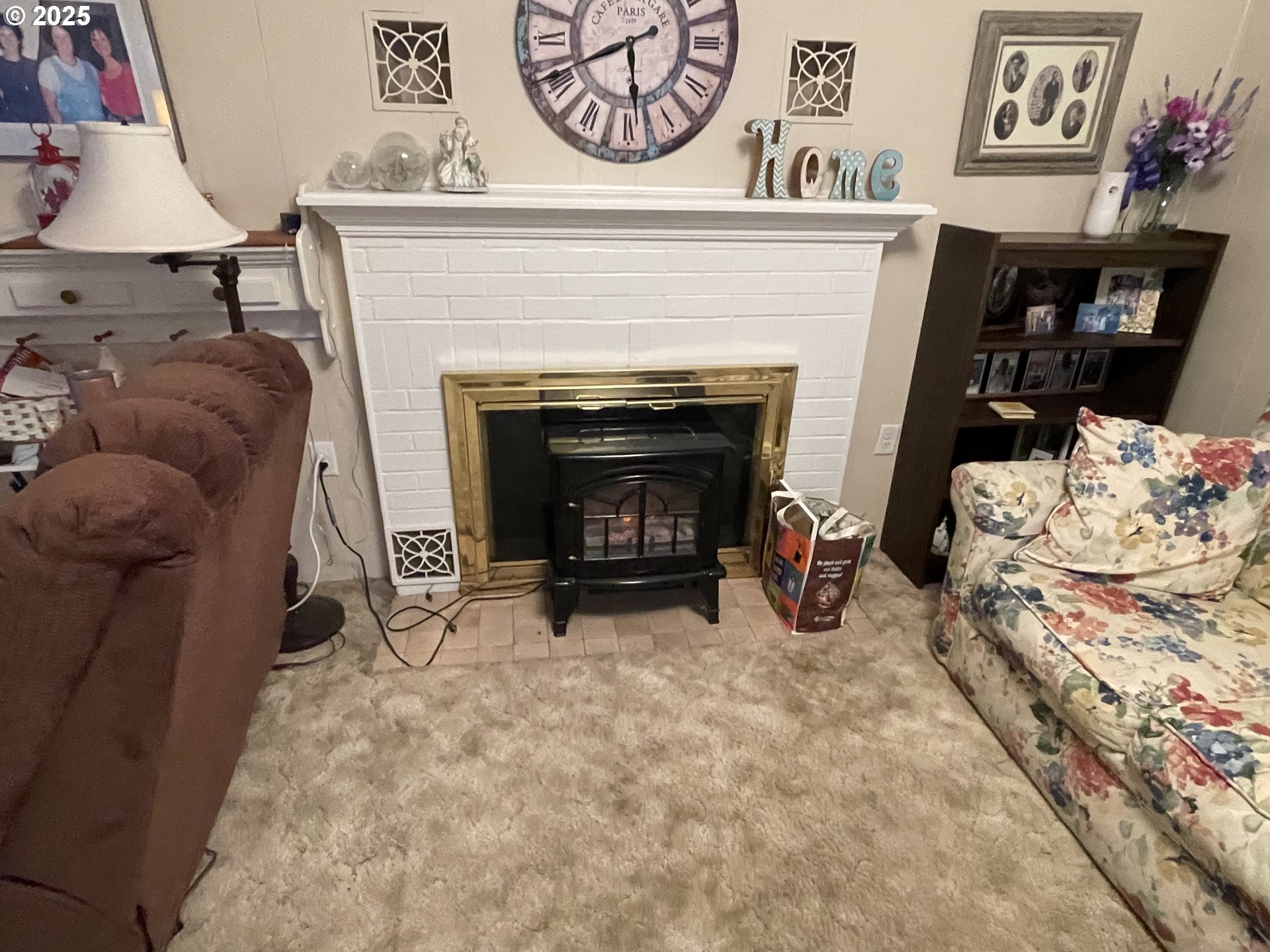 615 South E Hager Street Heppner, OR 97836 - Photo 4 of 14 a living room with furniture and a fireplace