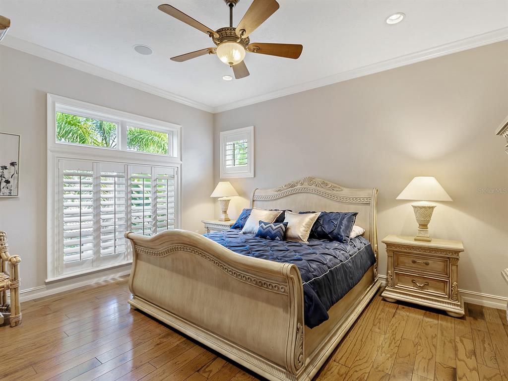 19428 Ganton Avenue Lakewood Ranch, FL 34202 - Photo 50 of 96 a bedroom with a bed and a large window