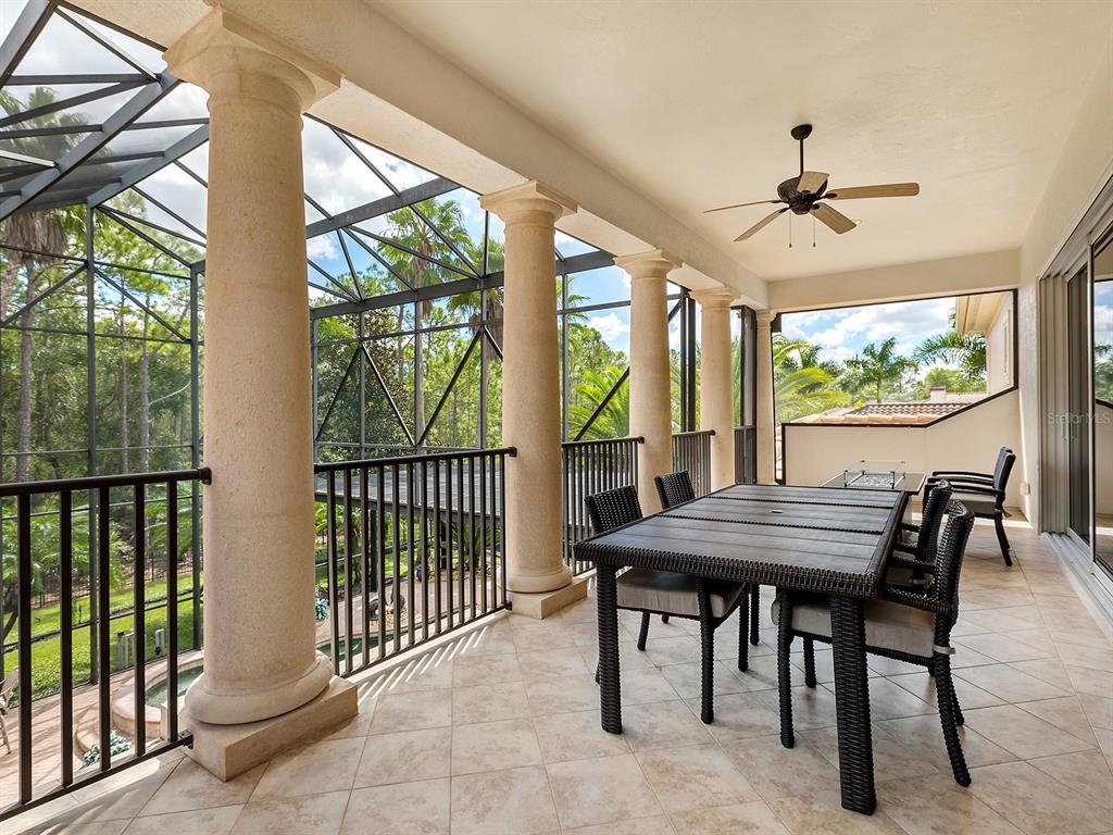 19428 Ganton Avenue Lakewood Ranch, FL 34202 - Photo 58 of 96 a view of a dining room with furniture window and outside view