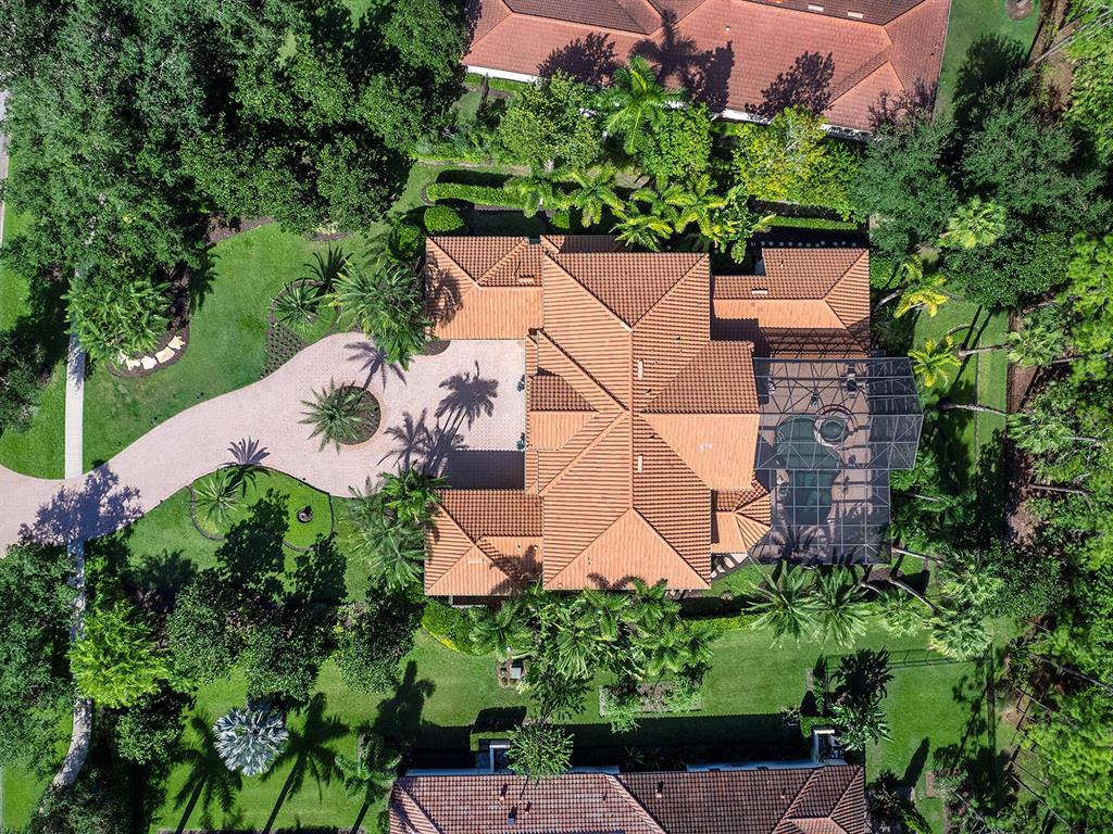 19428 Ganton Avenue Lakewood Ranch, FL 34202 - Photo 7 of 96 an aerial view of a house with a garden