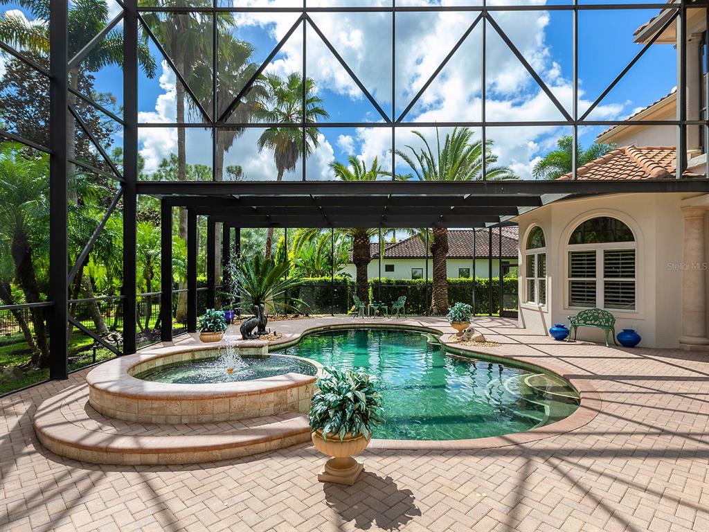 19428 Ganton Avenue Lakewood Ranch, FL 34202 - Photo 85 of 96 a view of a house with swimming pool and sitting area