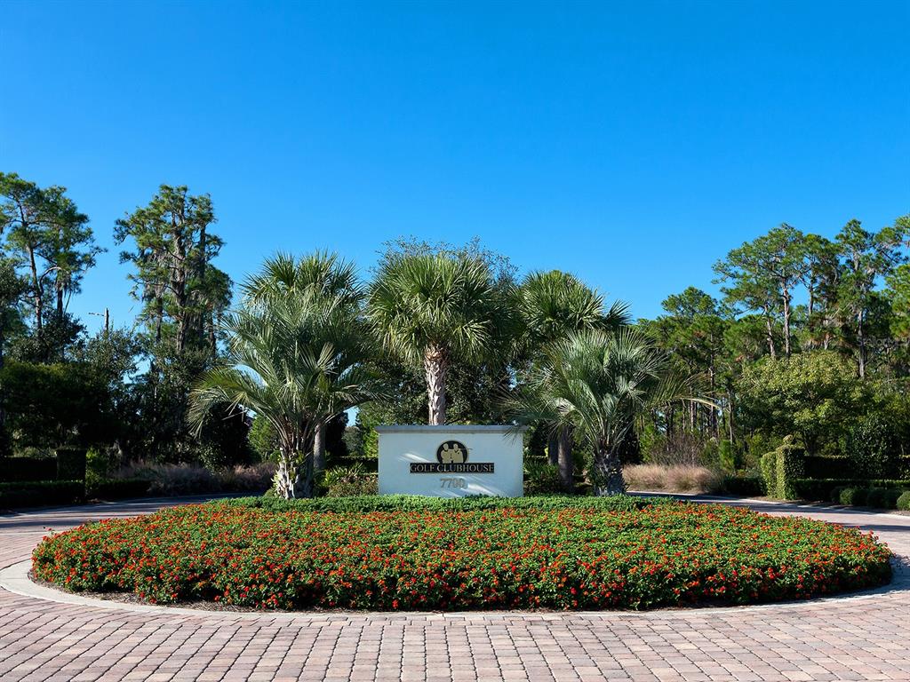 19428 Ganton Avenue Lakewood Ranch, FL 34202 - Photo 90 of 96 a front view of a house with a yard