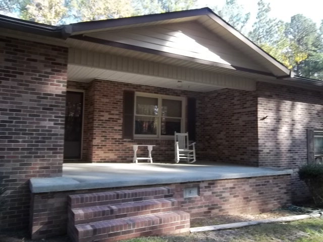 236 Plantation Road Gray, GA 31032 - Photo 13 of 26 a view of a house with a yard