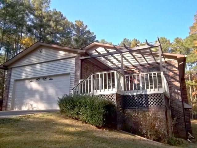 236 Plantation Road Gray, GA 31032 - Photo 3 of 26 a view of a house with a yard