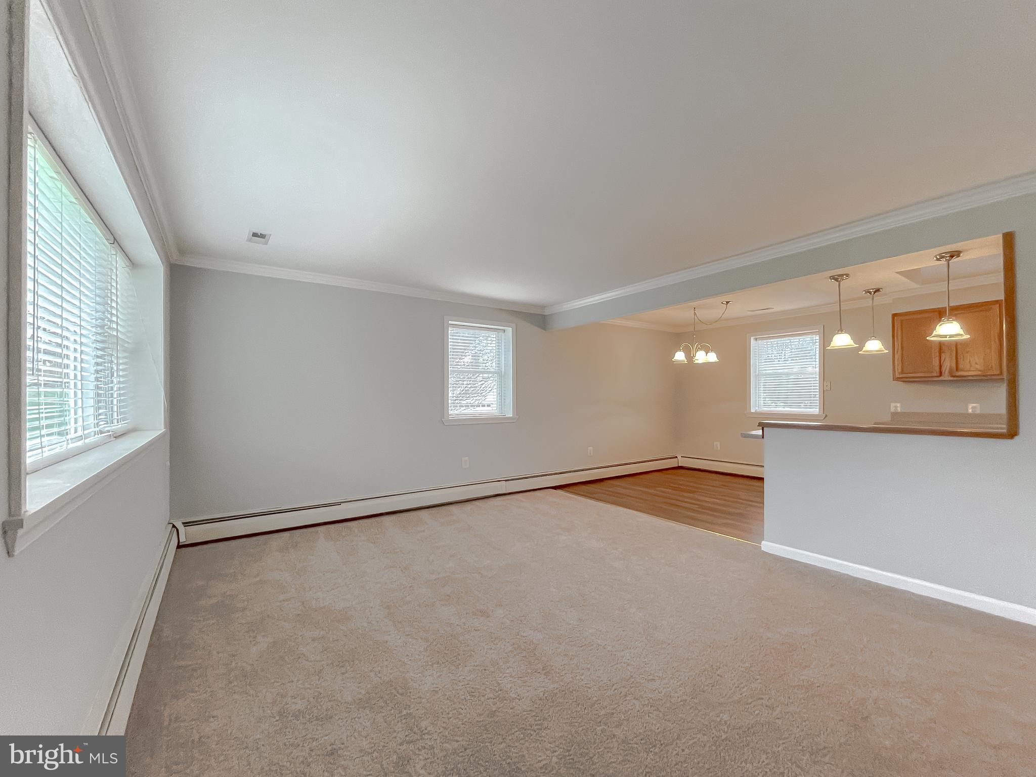 4485 Solomons Island Road Huntingtown, MD 20639 - Photo 17 of 46 an empty room with a window