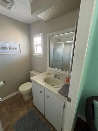 a bathroom with a sink and a toilet