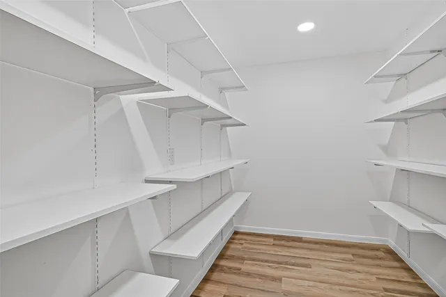 a view of entryway and kitchen