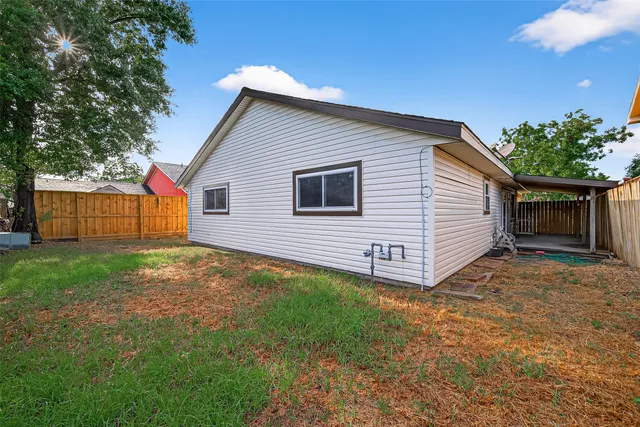a view of a backyard with a garden