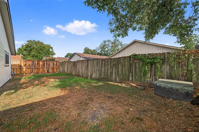 a view of a backyard with a garden
