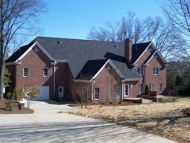 1045 Rockford Road High Point, NC 27262 - Photo 16 of 16 Exterior Back. You can access the garage from two streets. There is a front and back entrance to the 4 car garage. The back yard is fenced.