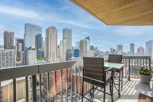545 North Dearborn Street, Unit 2510 Chicago, IL 60654 - Photo 17 of 22 a view of a chairs and table in the balcony