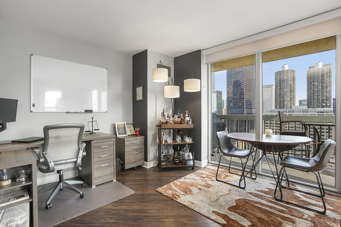 545 North Dearborn Street, Unit 2510 Chicago, IL 60654 - Photo 6 of 22 a view of a workspace with furniture and a window