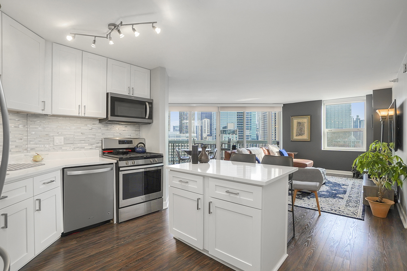 545 North Dearborn Street, Unit 2510 Chicago, IL 60654 - Photo 9 of 22 a kitchen with a sink stove and refrigerator