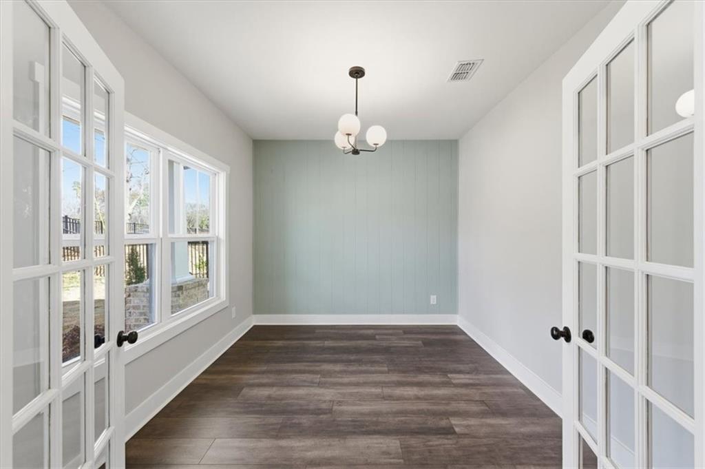 139 Old Alabama Road Southeast Emerson, GA 30137 - Photo 23 of 50 a view of an empty room with wooden floor and a window