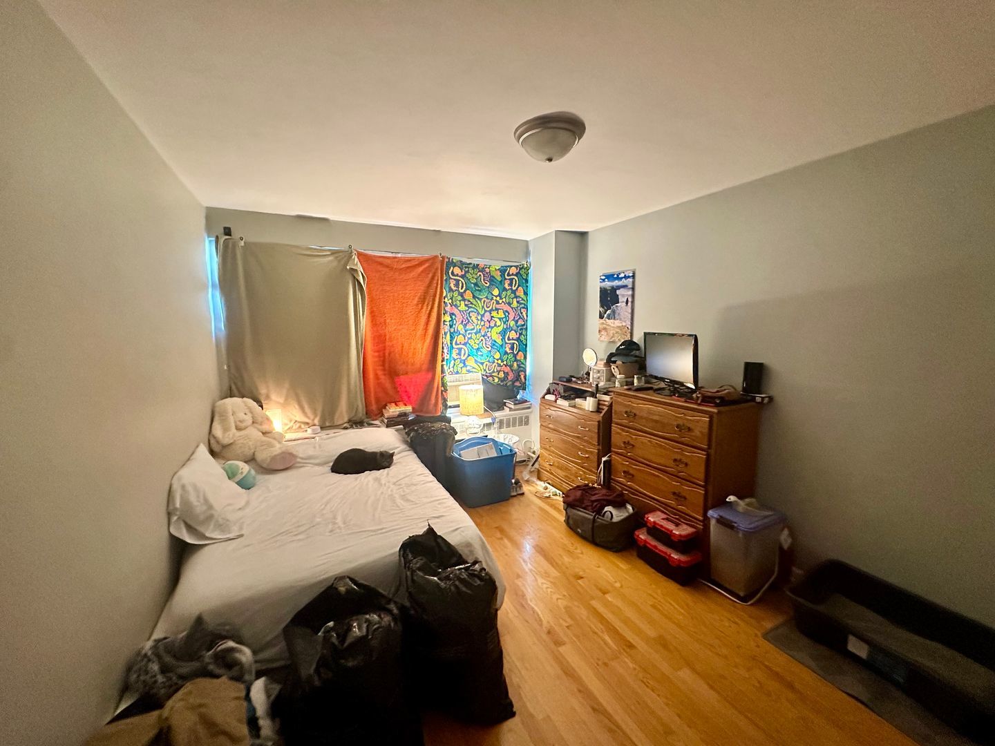 4180 North Marine Drive, Unit 1608 Chicago, IL 60613 - Photo 7 of 11 a bedroom with furniture and a window