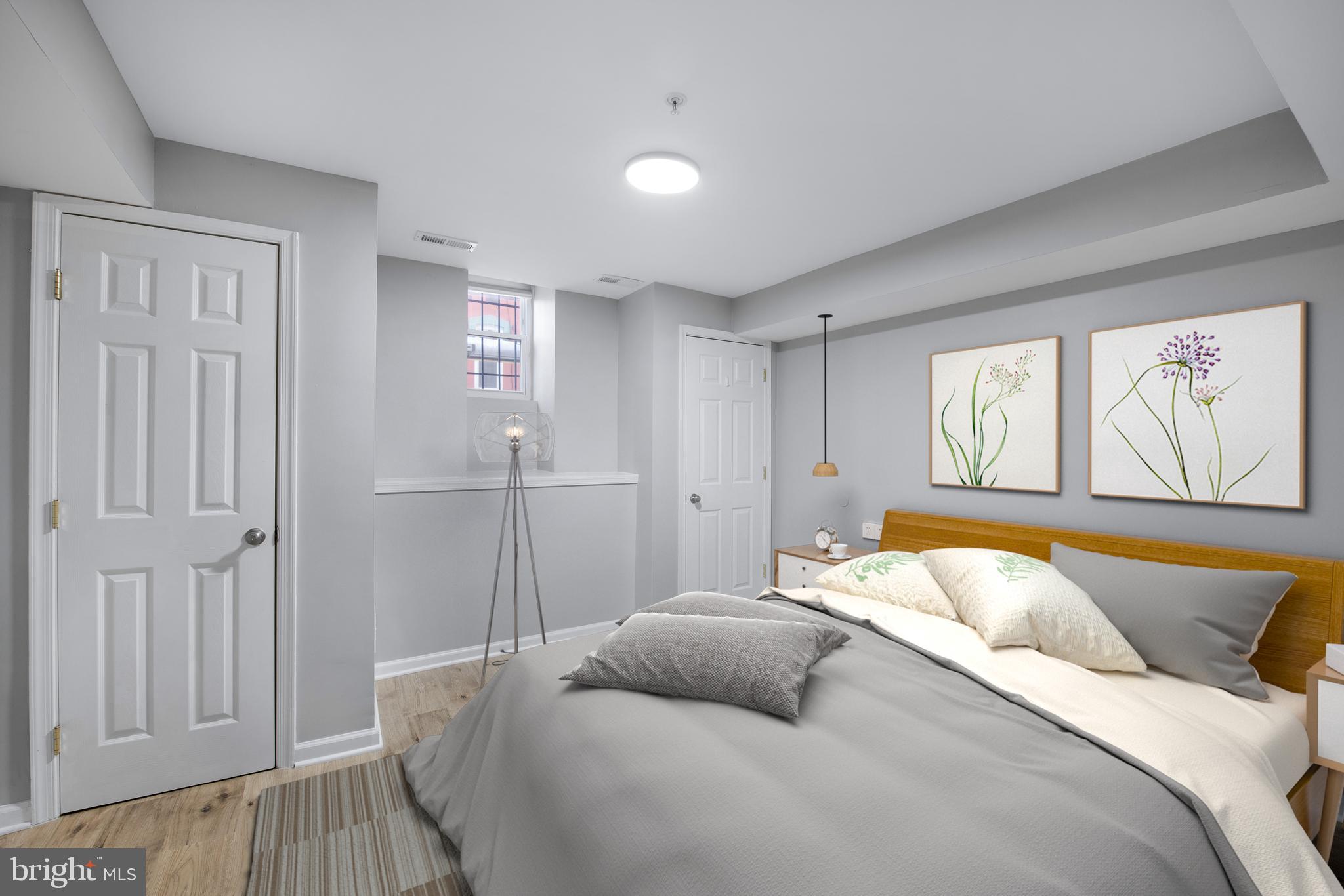 903 R Street Northwest, Unit 1 Washington, DC 20001 - Photo 26 of 32 a bedroom with a bed and a window